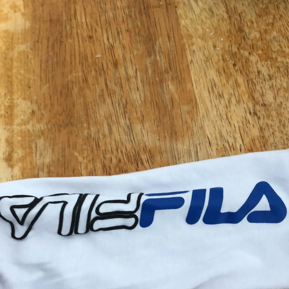 Fila long sleeved shirt. 10/12